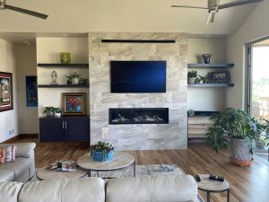 Interior-living room fireplace-name removed on TV-1